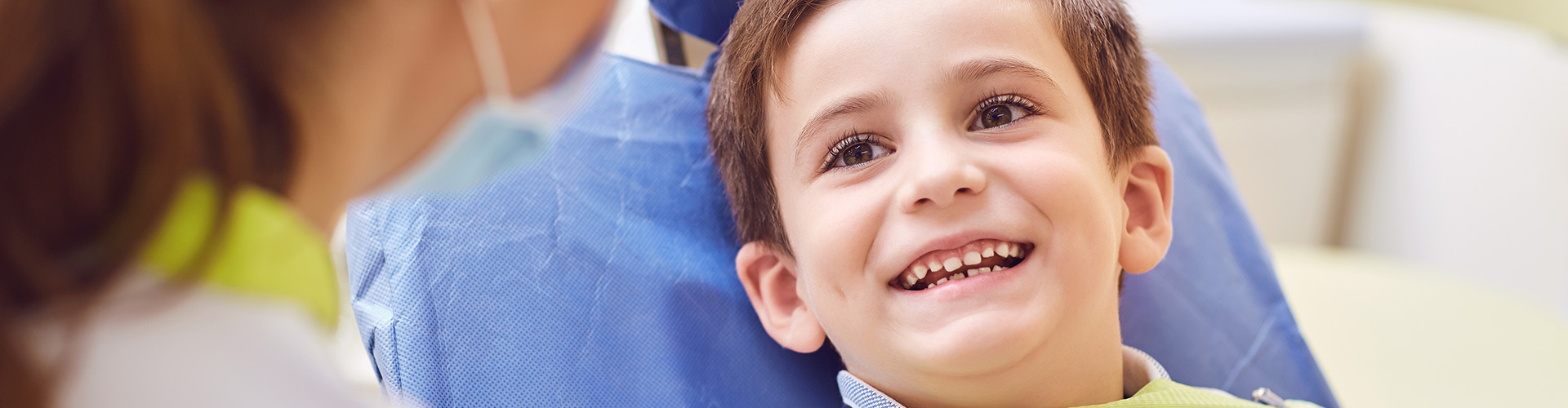 boy smiling at dentist