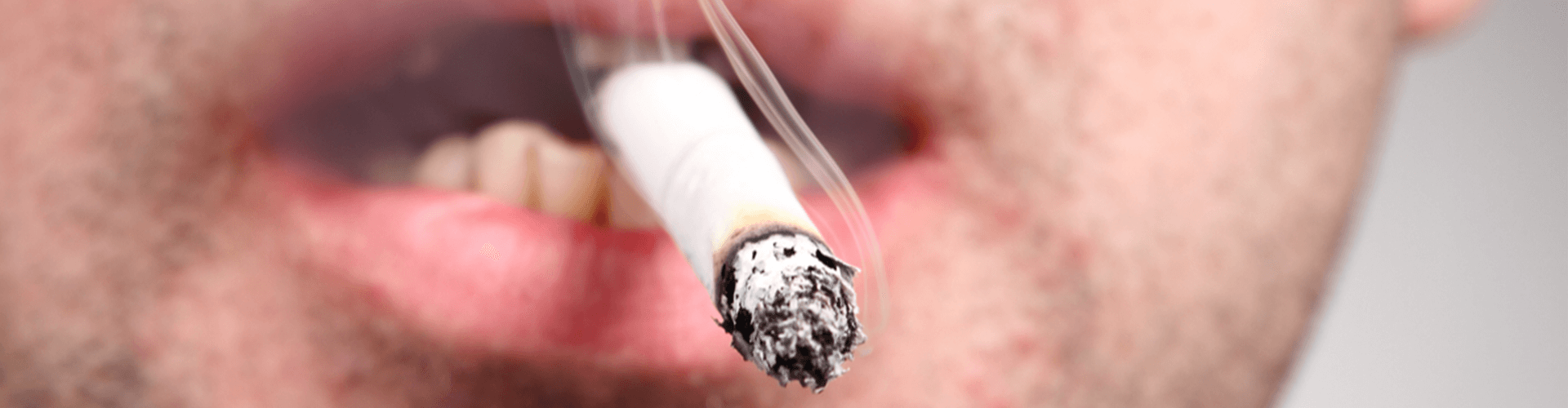 mouth with cigarette in it 