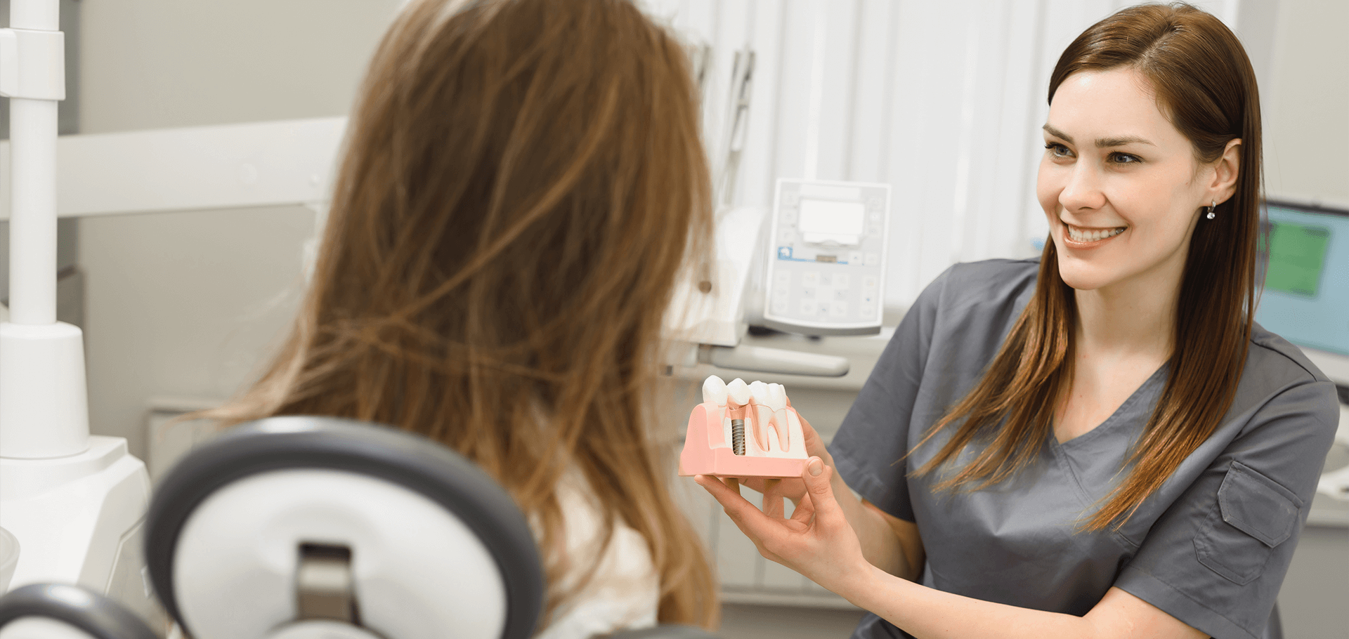 Patient checking out his new dental implants.