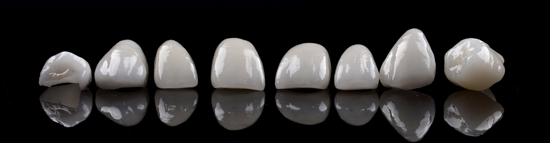 multiple crowns on a mirrored surface