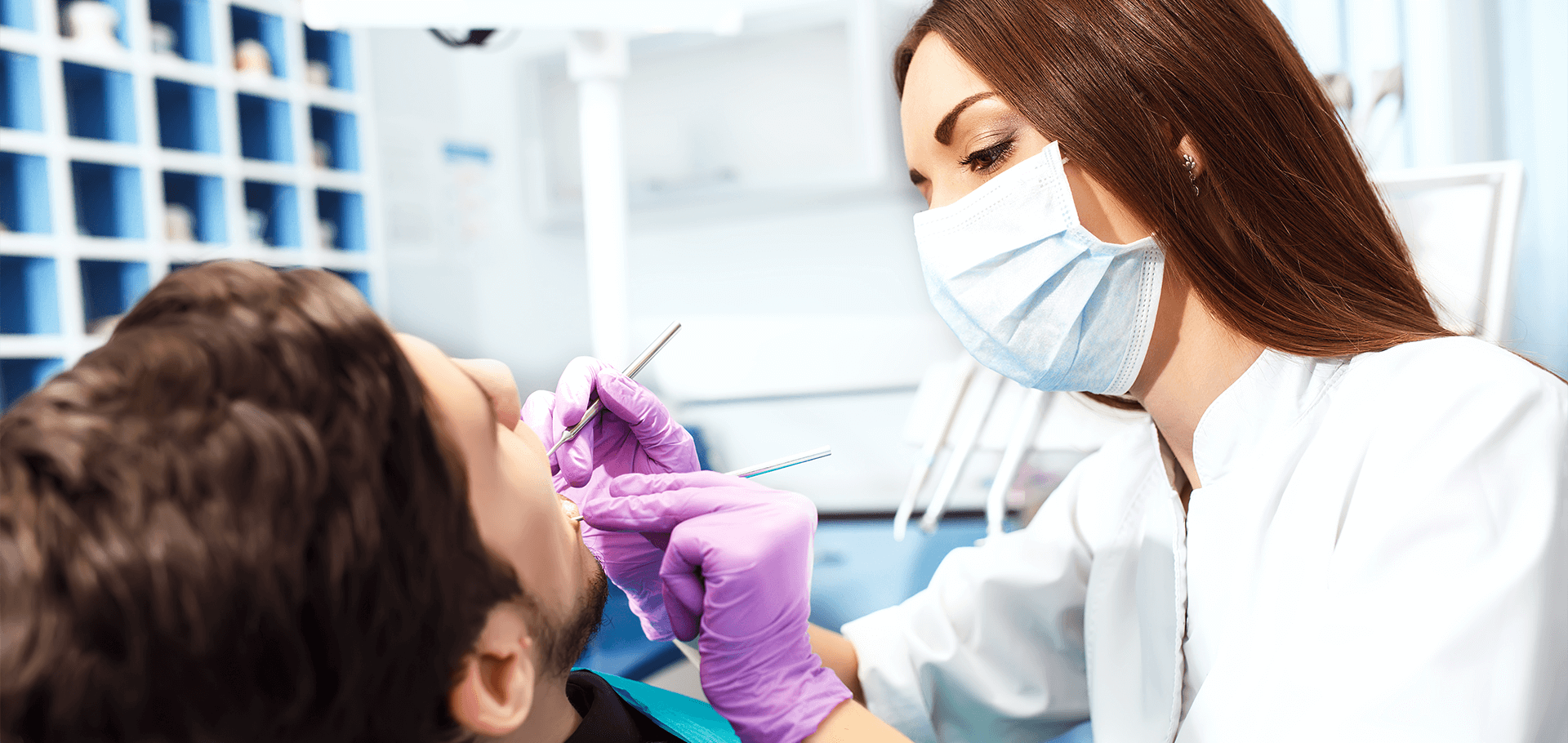 Dentist working on a  patient.