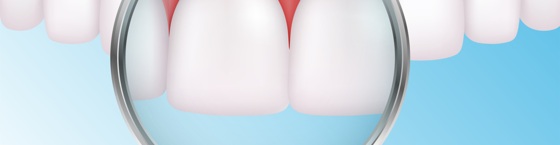 magnifying glass up to teeth 